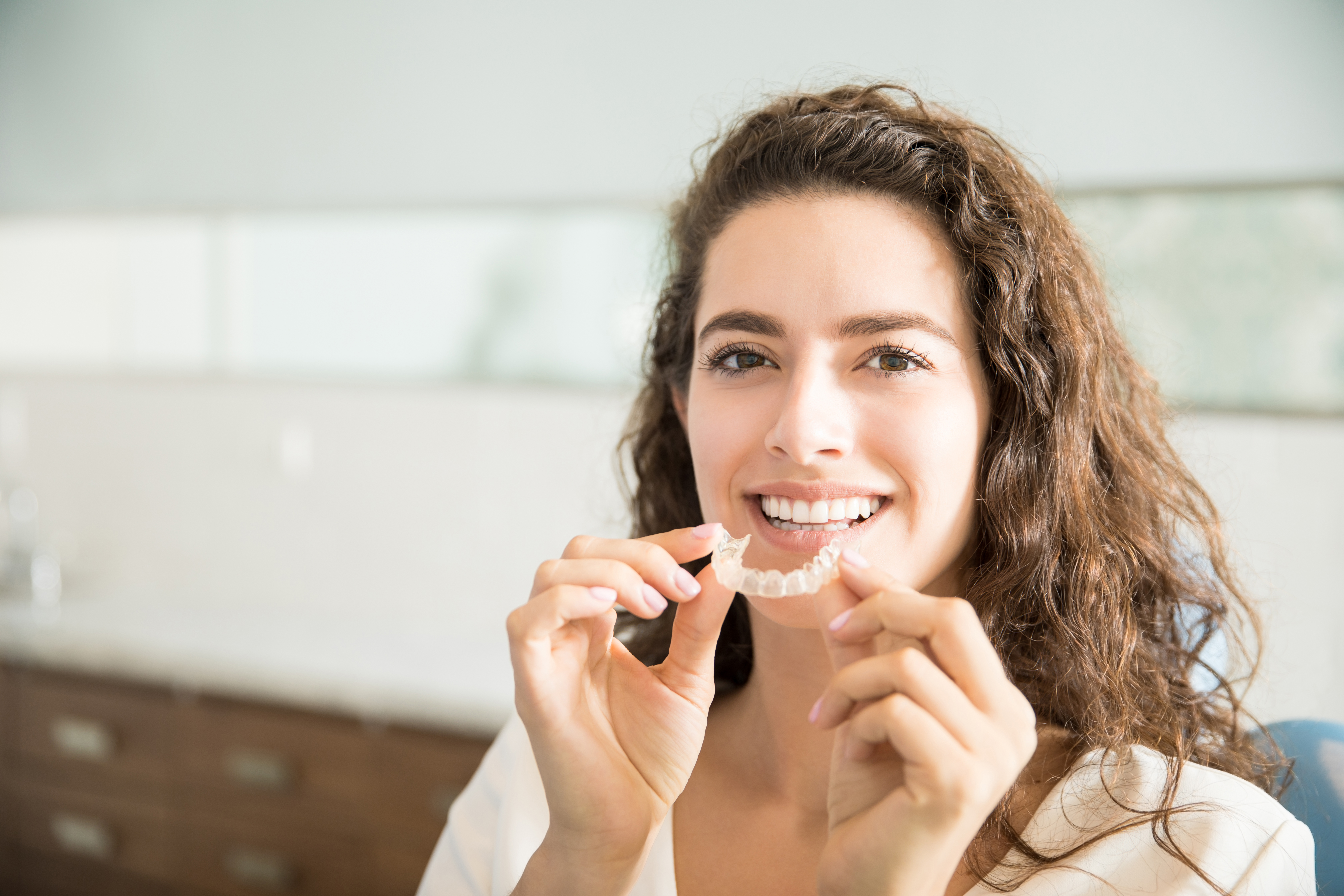 Girl with Clear Aligner